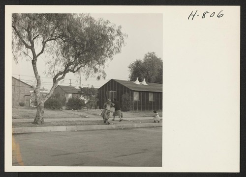 A portion of the Magnolia Housing Project at Burbank, California, where returned evacuees find temporary quarters while locating homes in the Los Angeles area. Photographer: Mace, Charles E. Burbank, California