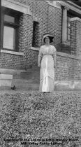 Lillian Gardner in front of the Carnegie Library, circa 1911