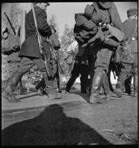 Soldiers: Road to Heinola. Marching [Soldiers walking down road]