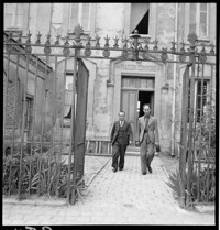 Reims: Dr. [Two men leaving "Maisson Commune" building]