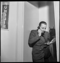 Journalists. Giovanni Artieri [on the phone]