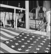 On Ship, 4:00 p.m. [SS Kastelholm. Evacuation of Americans] American flag