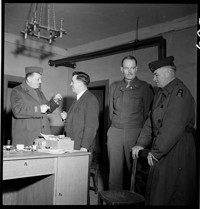 [Miscellaneous (Ammerschwihr): Mayor Roth, Colonel Gerry, Hartman, and unknown uniformed officer]