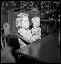 Miscellaneous Children: [girl with doll: possibly from dressmaking series, Ammerschwihr?.]