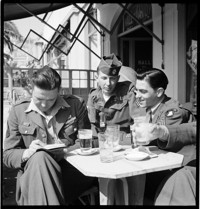 [US soldiers (101st Airborne) on leave in Nice, in the United States Riviera Rest Area (USRRA).] [Misidentified in logbooks as part of: Ordonnance Reims series.]