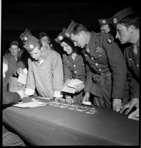 [US soldiers (101st Airborne) on leave in Nice, in the United States Riviera Rest Area (USRRA).] [Misidentified in logbooks as part of: Ordonnance Reims series.]