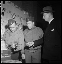 Reims: [Pierre Schneiter with American officers]