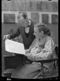 [Gertrude Stein and Virgil Thomson looking at a musical score.]