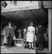 Swiss Cantine [adults and girl with pots and buckets. Foor or water, related to war relief?]