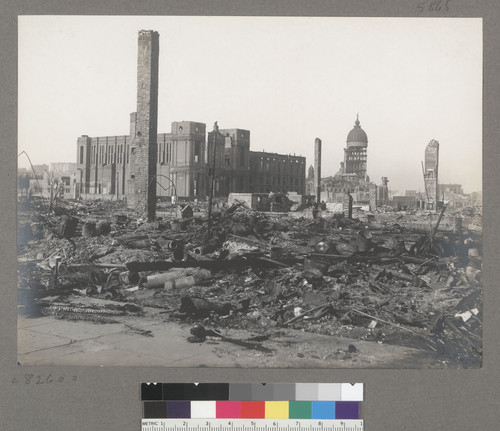 [Ruins and debris. St. Ignatius Church and College, center; City Hall in distance.]