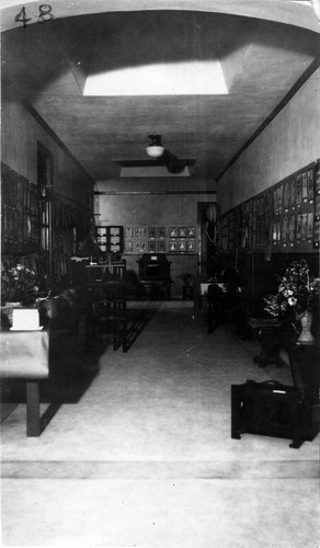 Interior of old school c1940. Art exhibit in the hall
