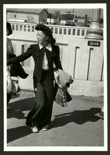 Internees walking to trains in Stockton, California