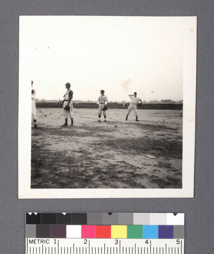 Baseball: panorama of uniformed infielders during game