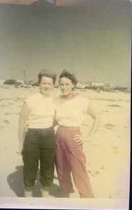 Ester Bentley and unidenfied woman at the beach