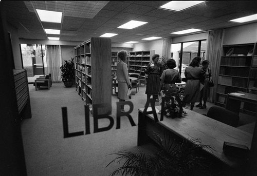 Women visiting a library