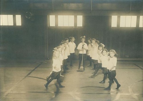 Group of girls posing in a gymnasium