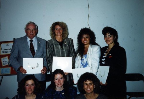 Group portrait of six women and one man