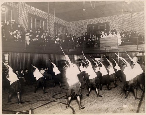 Female youths performing in the YWCA gym