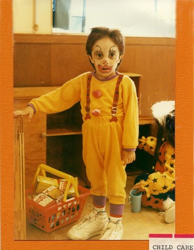 Young boy dressed as a clown for Halloween