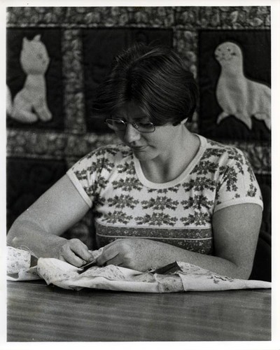 Woman hand sewing