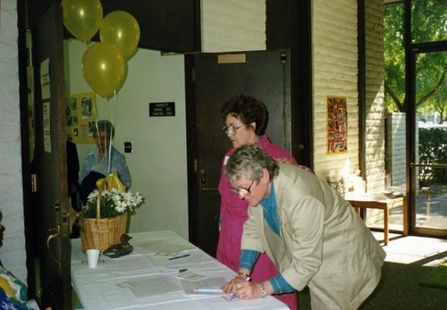 Women filling out name tags