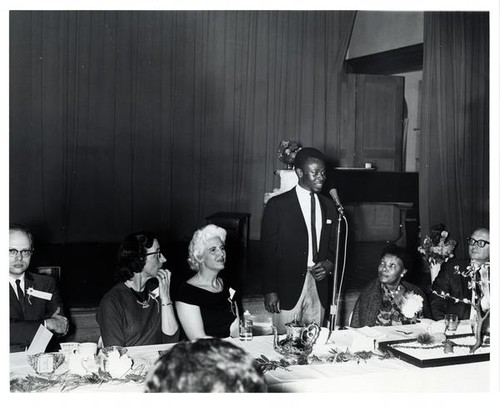 Man speaking at the 1965 YWCA annual meeting