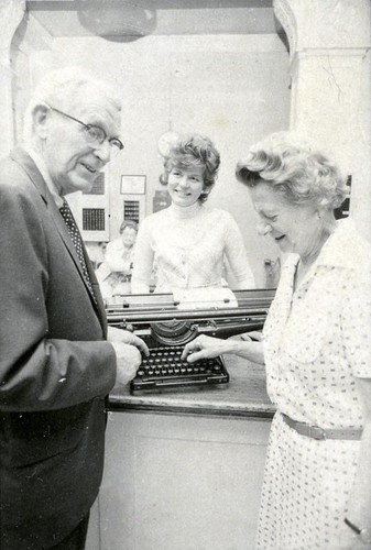 Chester and Mary Root with a typewriter