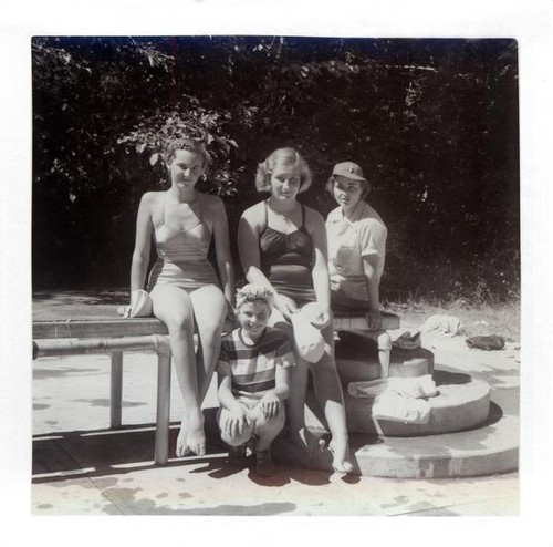 Group of girls posing on a diving board