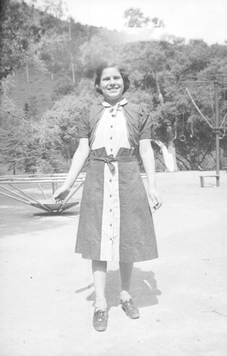 Teenage girl posing on a playground