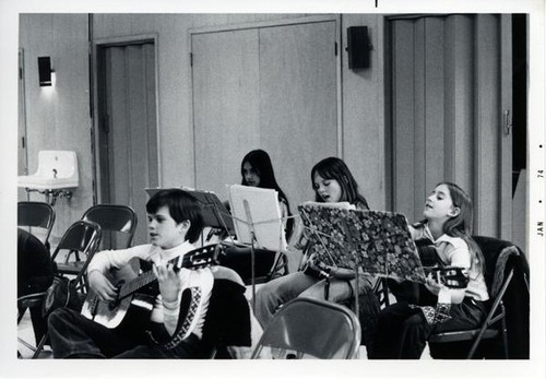 Children playing guitars