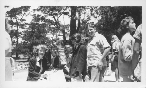 Teenage girls gathered outdoors at a conference