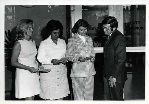 Three women and Mayor Norman Y. Mineta