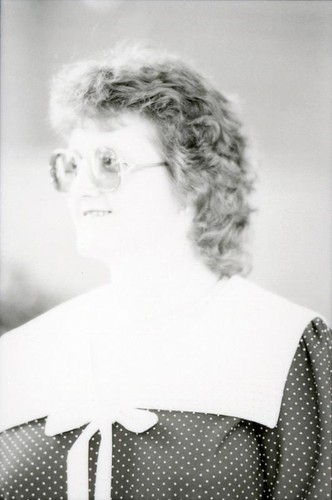 Woman with large-rimmed glasses