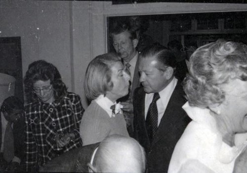 Men and women socializing at the 1973 YWCA annual meeting