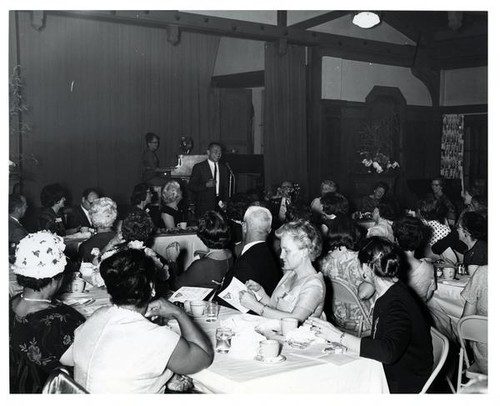 Man speaking at the 1965 YWCA annual meeting