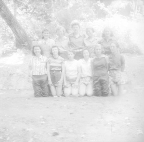 Teenage girls posing for a picture outdoors