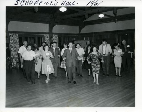 Men and woman learning to dance