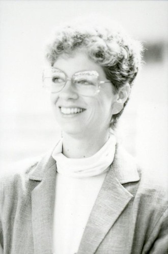 Woman with large-rimmed glasses