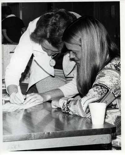 Woman demonstrating a craft