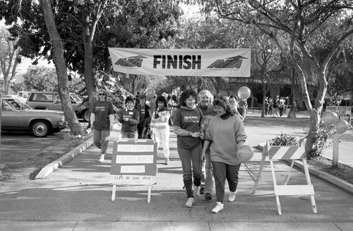 Participants at the 1986 y-Walk finish line