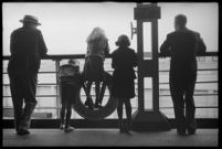 Passengers on the S.S. Mariposa on the deck looking out into the distance, Los Angeles
