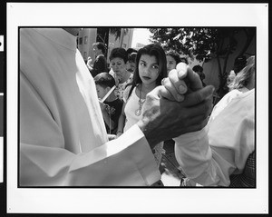 Holding hands with young woman watching, Dolores, Los Angeles 1996