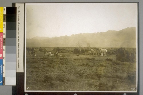 A party of prospectors on the desert searching for Borax