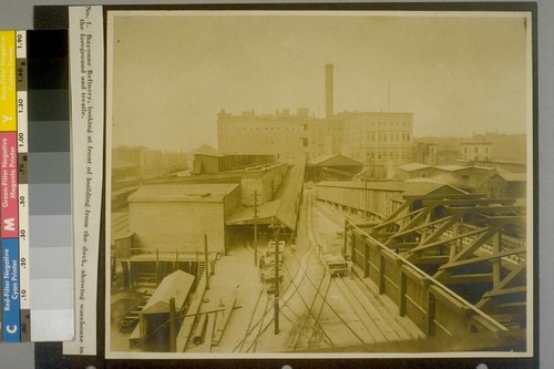 Bayonne Refinery, looking at front of building from the dock, showing warehouse in the foreground and trestle