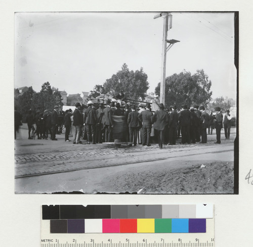 [Crowd gathered for bread rations at refugee camp. Jefferson Square?]