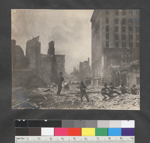 S.F. Cal. [Men pulling down wall? Bush St.? Mills Building at right?]