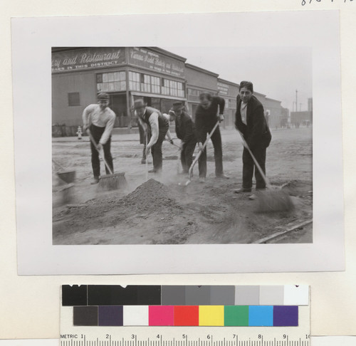 [Street cleaning scene. Unidentified location.]