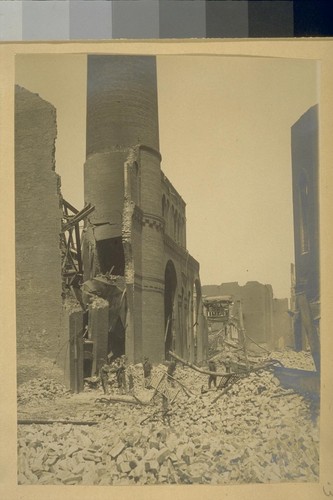 [Brick rubble around ruins of factory or industrial building.]