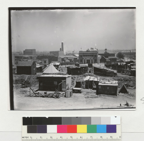 [Temporary housing and other structures. Unidentified location.]