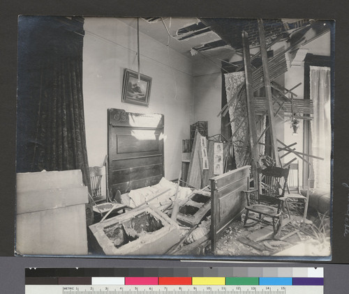 [Earthquake damage to residential interior.]